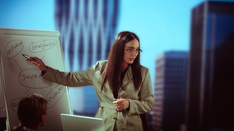 Businesswoman giving a presentation in modern office setting, Baghdad.