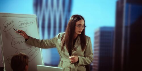 Photo by khezez | خزاز Businesswoman giving a presentation in modern office setting, Baghdad.
